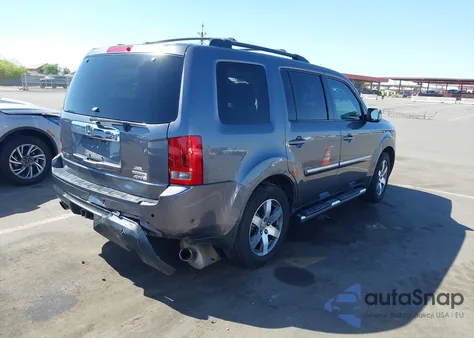 2014 Honda Pilot Touring z USA, uszkodzony, nr VIN 5FNYF4H90EB033259